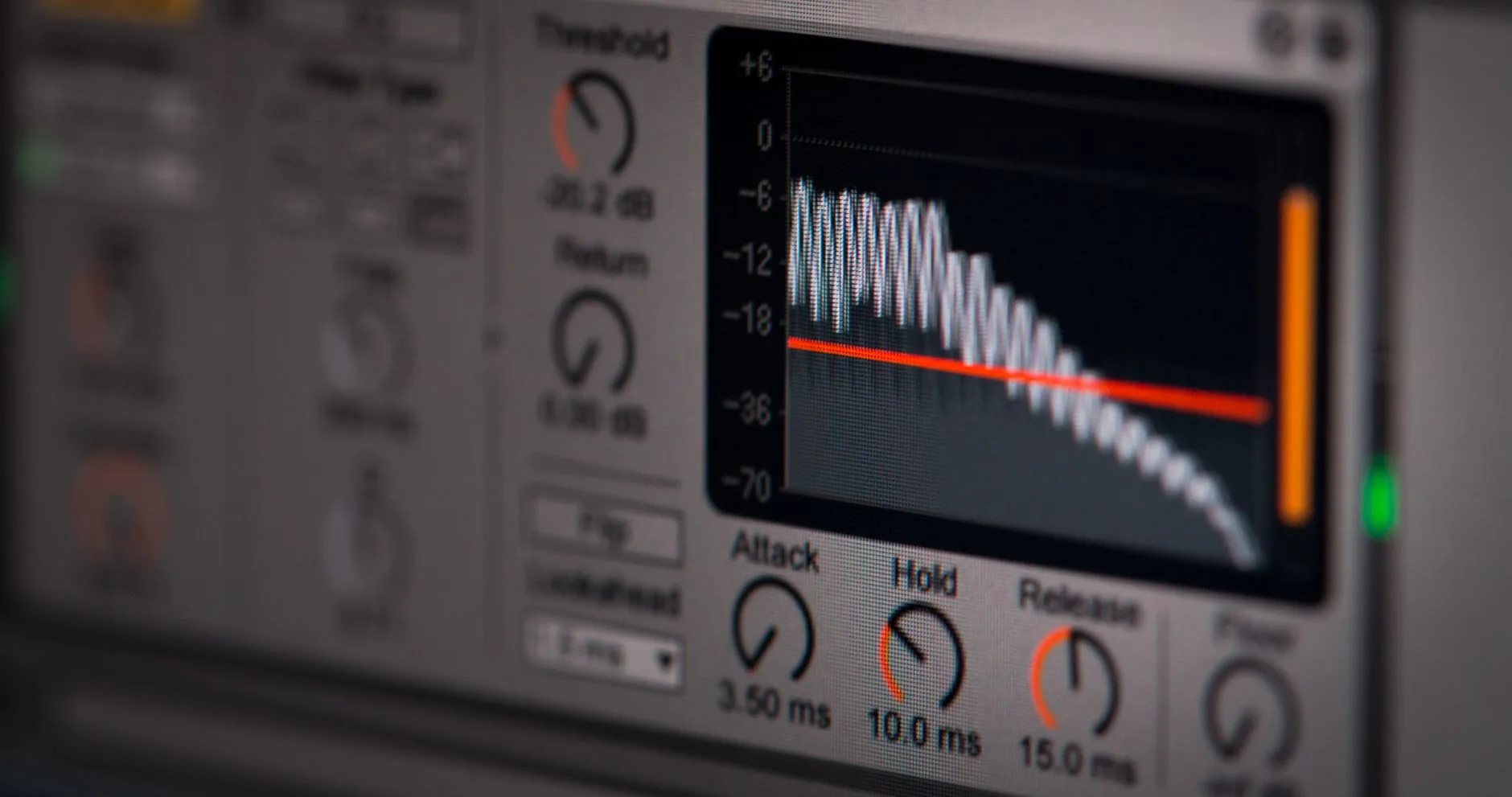 A person speaking, real-time soundwave visualization in muted, desaturated colors.